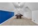 Spacious game room featuring a pool table and bright blue accent wall at 2225 Mountain Creek Dr, Tucker, GA 30087