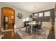 Bright dining room with hardwood floors and a farmhouse table at 510 Kentwood Rd, Woodstock, GA 30188