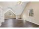 Spacious bedroom with vaulted ceiling, ceiling fan, and built-in shelving at 4684 Pine Dr, Loganville, GA 30052
