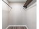 Walk-in closet with shelving and hanging rods at 4684 Pine Dr, Loganville, GA 30052