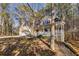 Two-story house with a wraparound porch and attached garage at 4684 Pine Dr, Loganville, GA 30052