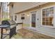 Exterior view of the house showcasing a deck and wooded area at 4684 Pine Dr, Loganville, GA 30052