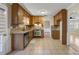 Kitchen with granite countertops, wood cabinets, and stainless steel appliances at 4684 Pine Dr, Loganville, GA 30052