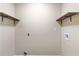 Laundry room with shelving for storage at 4684 Pine Dr, Loganville, GA 30052