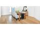 Modern dining room with a long wooden table and patterned chairs at 500 Covington Cv, Alpharetta, GA 30022