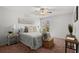 Main bedroom with ceiling fan and plush bedding at 3301 Henderson Mill Rd # A2, Atlanta, GA 30341