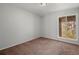 Spacious bedroom with large window and carpet at 3301 Henderson Mill Rd # A2, Atlanta, GA 30341