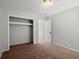 Bright bedroom with neutral walls and carpet at 3301 Henderson Mill Rd # A2, Atlanta, GA 30341