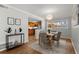 Dining room with wood table and chairs, kitchen view at 3301 Henderson Mill Rd # A2, Atlanta, GA 30341