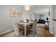 Dining area with wooden table and view to living room at 3301 Henderson Mill Rd # A2, Atlanta, GA 30341