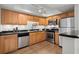 Kitchen with stainless steel appliances and wood cabinets at 3301 Henderson Mill Rd # A2, Atlanta, GA 30341
