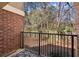 Private patio with wooded backyard view at 3301 Henderson Mill Rd # A2, Atlanta, GA 30341