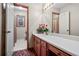 Bathroom with vanity, shower, and window at 3985 W Stubbs Rd, Atlanta, GA 30349