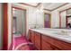 Double vanity bathroom with updated countertops and flooring at 3985 W Stubbs Rd, Atlanta, GA 30349