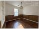 Cozy bedroom with hardwood floors and built-in shelves at 5039 East St, Forest Park, GA 30297