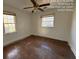 Bedroom with hardwood floors and two windows at 5039 East St, Forest Park, GA 30297