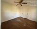 Bedroom with hardwood floors and double closets at 5039 East St, Forest Park, GA 30297