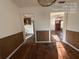 View from dining room into living room and kitchen at 5039 East St, Forest Park, GA 30297