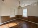 Bright dining room with hardwood floors and built-in shelving at 5039 East St, Forest Park, GA 30297