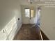 Laundry area with tile floor and exterior access at 5039 East St, Forest Park, GA 30297