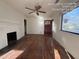 Living room with hardwood floors and fireplace at 5039 East St, Forest Park, GA 30297