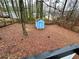 Spacious backyard with storage shed and tree coverage at 7035 Stone Wood Nw Dr, Kennesaw, GA 30152