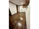 Finished basement room with dark wood-look floors and built-in shelving at 7035 Stone Wood Nw Dr, Kennesaw, GA 30152
