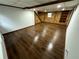 Finished basement offering ample living space with wood-look flooring at 7035 Stone Wood Nw Dr, Kennesaw, GA 30152
