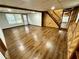 Finished basement with an open floor plan and wood-look flooring at 7035 Stone Wood Nw Dr, Kennesaw, GA 30152