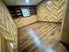 Finished basement features wood-paneled walls and new flooring at 7035 Stone Wood Nw Dr, Kennesaw, GA 30152