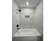 Clean bathroom with a marble shower and bathtub at 7035 Stone Wood Nw Dr, Kennesaw, GA 30152