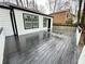 Large deck overlooks wooded backyard, perfect for entertaining at 7035 Stone Wood Nw Dr, Kennesaw, GA 30152