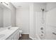 Well-lit bathroom featuring a tub, shower, and vanity with double sinks at 3742 Berkeley Xing, Duluth, GA 30096
