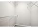 Walk-in closet with gray carpeting and wire shelving at 3742 Berkeley Xing, Duluth, GA 30096