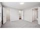 Main bedroom featuring neutral walls and plush carpet and attached bath and closet at 3742 Berkeley Xing, Duluth, GA 30096