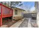 Backyard view of house, deck and storage shed at 3886 Cedar Trace Ln, Ellenwood, GA 30294