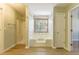 Bathroom with soaking tub and separate shower at 3886 Cedar Trace Ln, Ellenwood, GA 30294