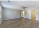 Spacious bedroom with ceiling fan and hardwood floors at 3886 Cedar Trace Ln, Ellenwood, GA 30294