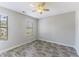 Bright bedroom with ceiling fan and hardwood floors at 3886 Cedar Trace Ln, Ellenwood, GA 30294