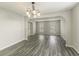 Dining room with hardwood floors and large window at 3886 Cedar Trace Ln, Ellenwood, GA 30294