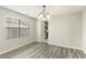 Dining area with hardwood floors and kitchen access at 3886 Cedar Trace Ln, Ellenwood, GA 30294