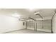 Bright two-car garage with automatic openers at 3886 Cedar Trace Ln, Ellenwood, GA 30294