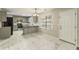 Kitchen with eat-in area and marble-look floors at 3886 Cedar Trace Ln, Ellenwood, GA 30294
