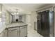 Modern kitchen with granite countertops and stainless steel appliances at 3886 Cedar Trace Ln, Ellenwood, GA 30294