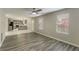 Open living room featuring hardwood floors and kitchen view at 3886 Cedar Trace Ln, Ellenwood, GA 30294