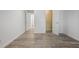 Bedroom with wood-look flooring and access to bathroom and closet at 1647 Raleigh Se Cir, Marietta, GA 30067