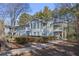 Light blue multi-unit building with balconies and landscaping at 1647 Raleigh Se Cir, Marietta, GA 30067
