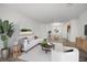 Bright and spacious living room with hardwood floors and a dining area at 1647 Raleigh Se Cir, Marietta, GA 30067