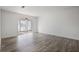 Living room with hardwood floors and access to a patio at 1647 Raleigh Se Cir, Marietta, GA 30067