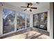 Sunroom with wood-look flooring and access to a balcony at 1647 Raleigh Se Cir, Marietta, GA 30067